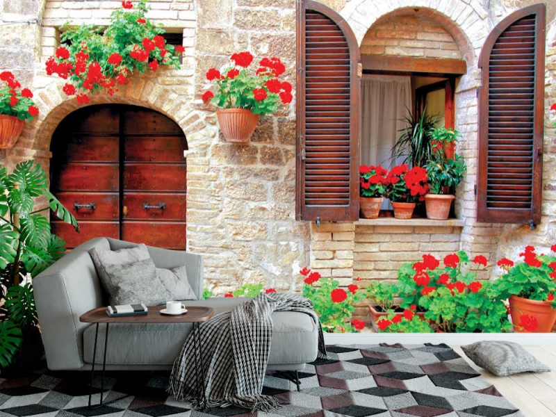 Fototapet italienskt hus med färgglada krukväxter (27064524) 